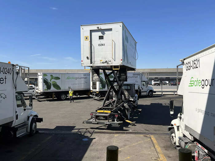 When the food is ready to leave, specially designed trucks transfer them to the plane.