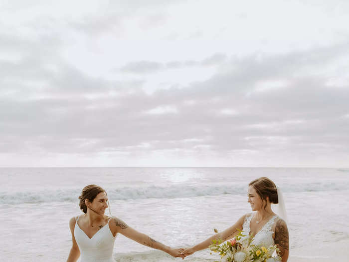 The brides only planned to wear their dresses for their beach photo shoot, so they went with more affordable options.