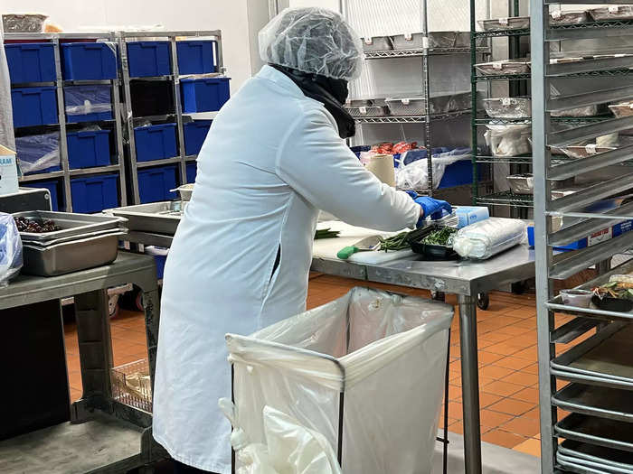 Once inside, we learned about the process of turning raw ingredients into meals and how the company stores and transports those dishes for each flight.