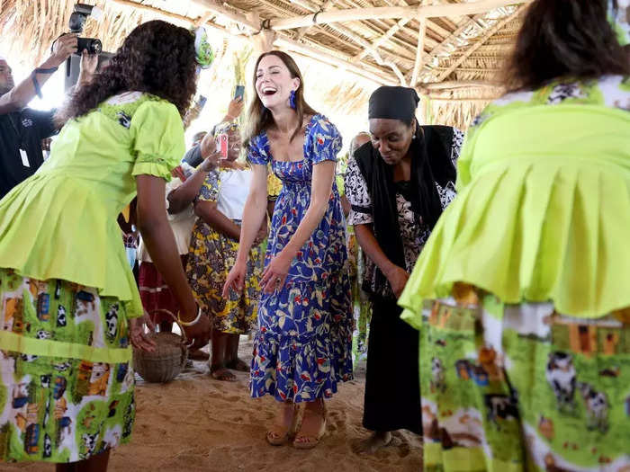 Locals in the coastal town of Hopkins, Belize, pulled Middleton into a dance at a traditional Garifuna festival.