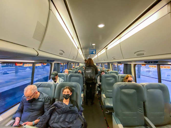 As I boarded the train, I noticed that the seats looked larger than those on other trains I had been on in the past. They also seemed to me to be closer together than seats on other trains I