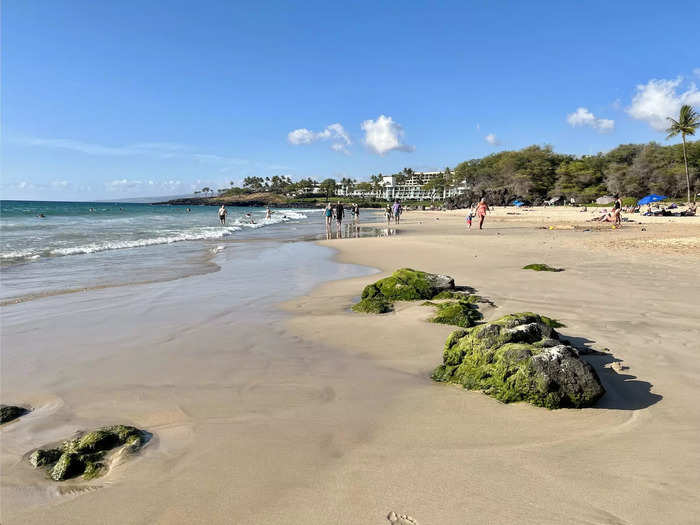 After befriending a nearby group who agreed to keep an eye on my things, I took a walk to the north end of the beach.