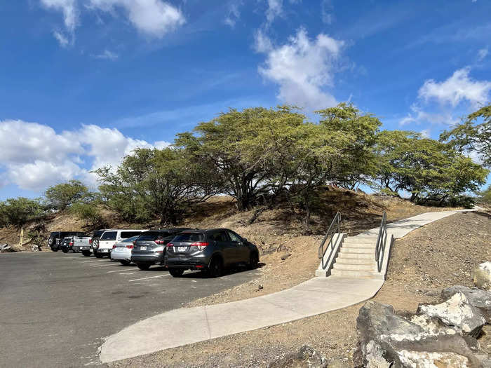 There are two parking lots — an upper and a lower option — and a walkway that leads to the beach.