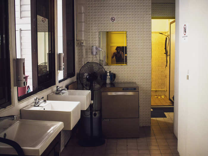 The shared bathroom had an open-air layout, so it had better ventilation than the room did.