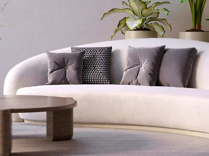 Sculptural sofas are a cozy spring trend.