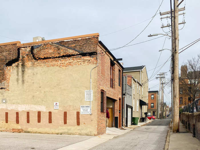 I was intrigued by a one-bedroom loft that used to be a carriage house listed on Zillow for $1,550/month in the neighborhood of Fells Point.