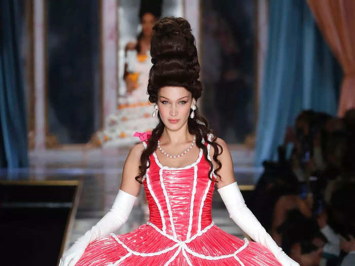 She returned to whimsical fashion the following month on a Moschino runway.