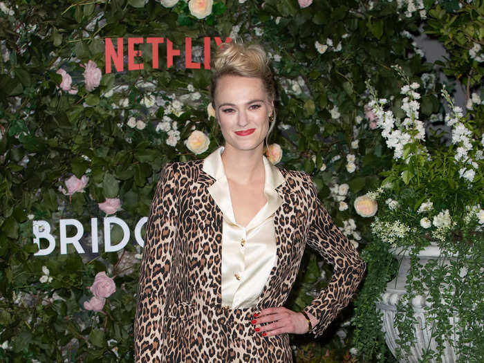 Jessica Madsen, who plays another debutante, came to the red carpet in a leopard print suit.