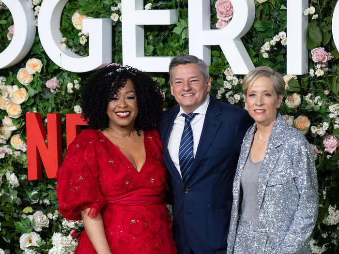 Executive producers Shonda Rhimes and Betsy Beers pose with Netflix co-CEO Ted Sarandos.