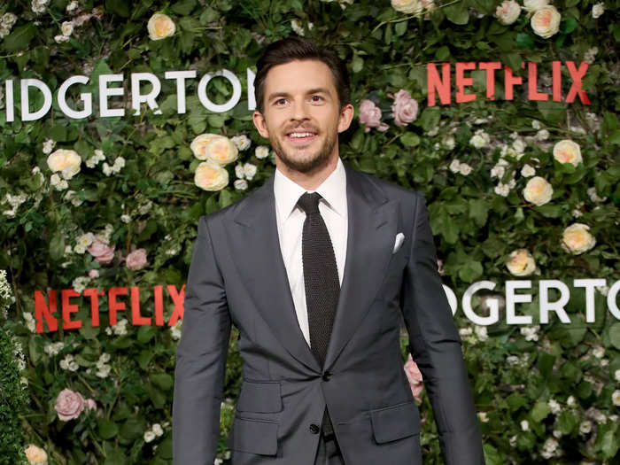 Jonathan Bailey, looking dapper in a grey suit, takes the lead in season 2 as the eldest son, Viscount Anthony Bridgerton.