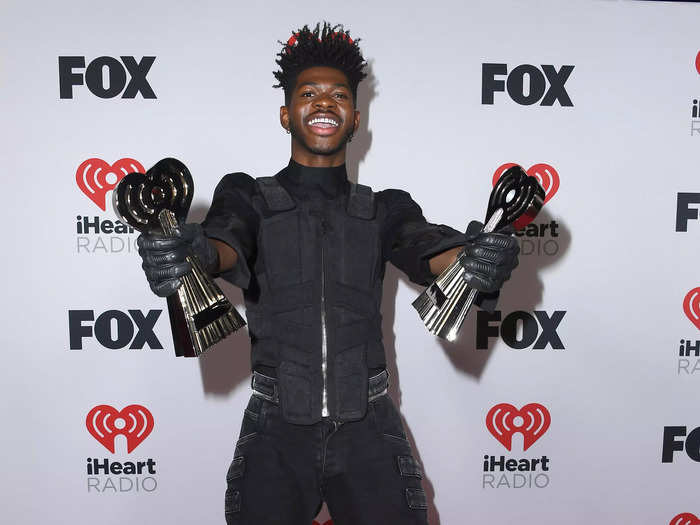 Lil Nas X, who picked up two awards, also opted for all black in a military vest and cargo pants.
