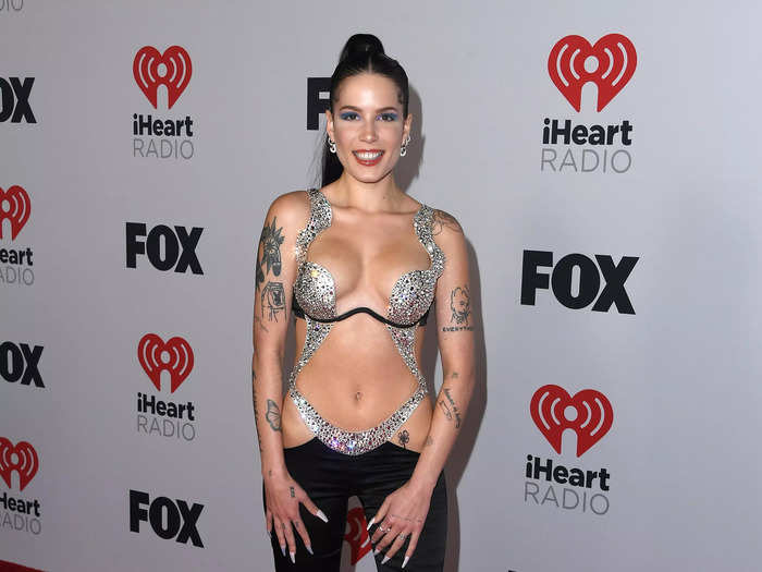 Halsey wore a daring sparkly bra that joined to the waistband of her hipster flared pants at Tuesday