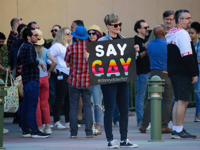 Some employees held signs with blunt messages, like "Say Gay."