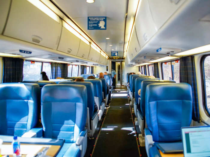When reserving a ticket, Amtrak automatically assigns you a seat, but you can change it anytime after booking. In first-class Acela cars, there are two seats on one side and one seat on the other. Seats face both directions.