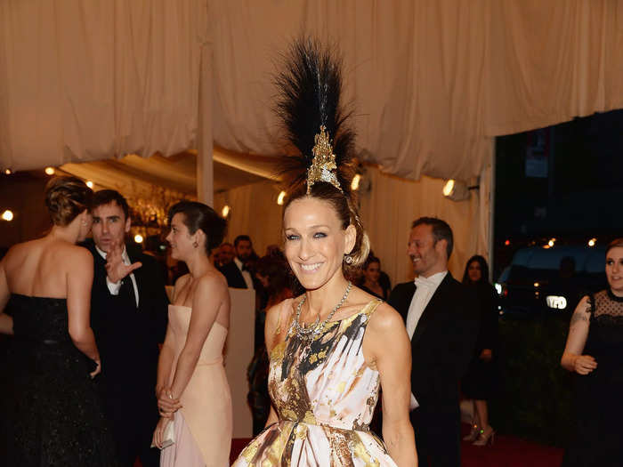 At the punk-themed Met Gala in 2013, Parker wore a feathery headpiece.