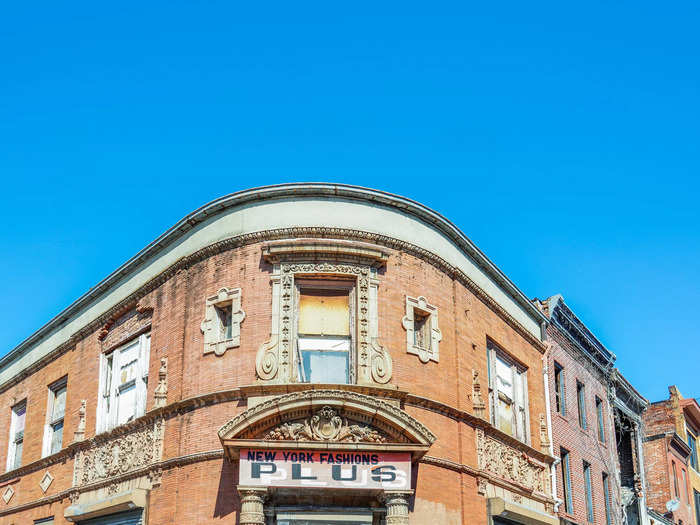 Walking around the once-thriving market, I noticed that many of the buildings looked frozen in time with faded signs.