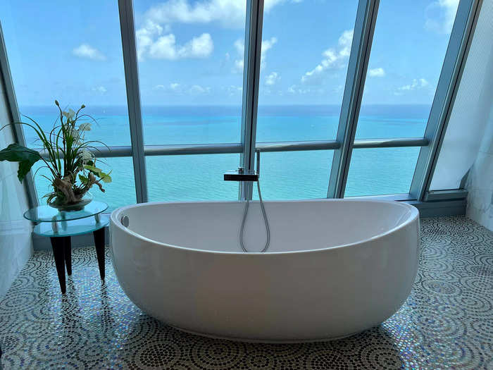 Off the master suite are walk-in closets and his and hers bathrooms, which include their own sinks and bathing areas. You can find me soaking in this tub for the rest of my life.