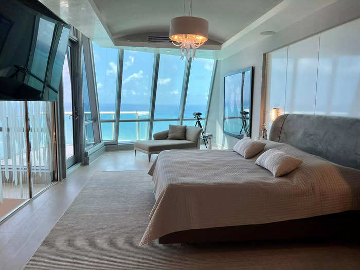 The master suite featured both interior and exterior views: the ocean and the stunning stairwell. Motorized window treatments blacked out the room for bed time.