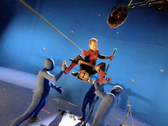 One shot of Maguire swinging with his webs required the assistance of three people wearing blue suits.