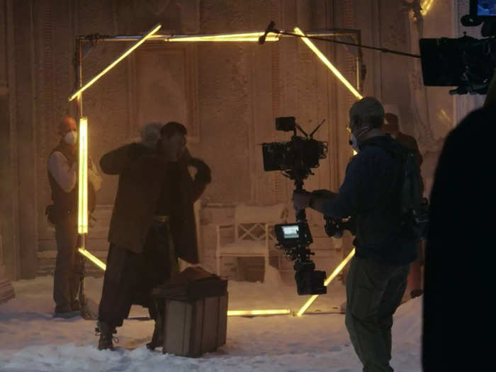 While filming scenes involving magic portals, the actors walked through a large frame that had light bars attached to the perimeter.