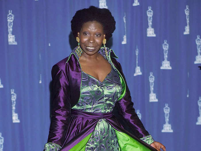 Whoopi Goldberg wore a green and purple jumpsuit with a dramatic cape at the 1993 Oscars.