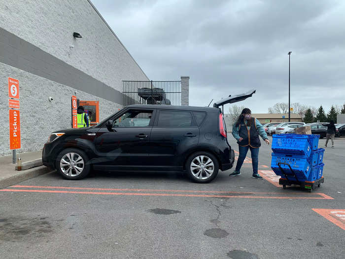 Then, groceries get loaded into the trunk.