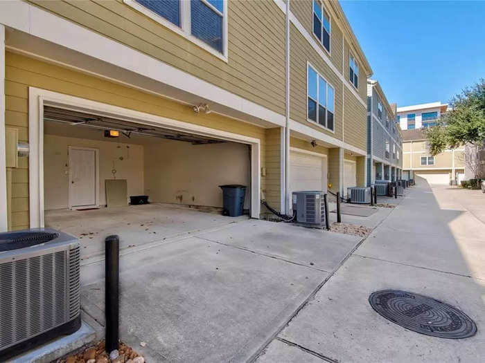 The house comes with a garage that includes a 220-volt charger for Tesla owners.