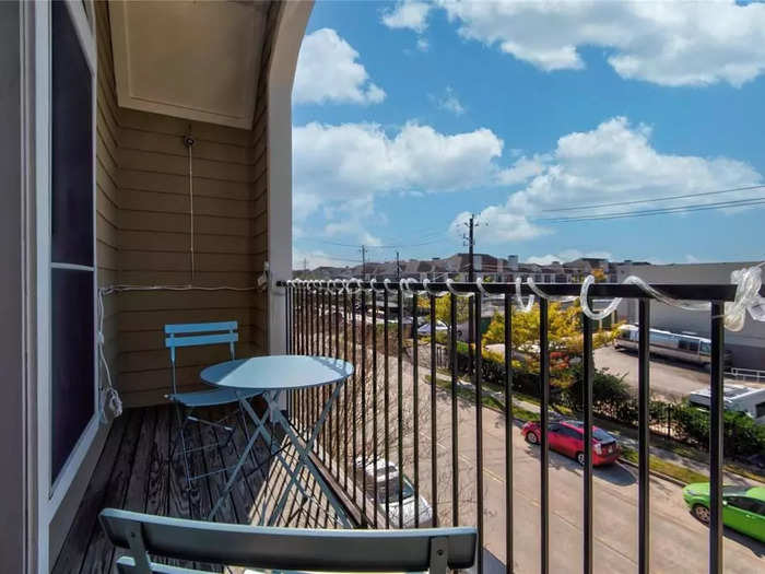 ... and other amenities like a balcony overlooking the street.