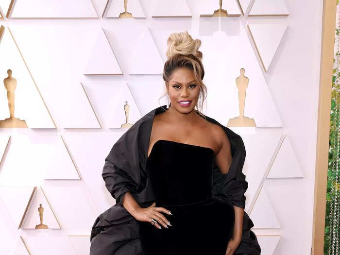 Laverne Cox paired her strapless, black August Getty gown with a statement cape.