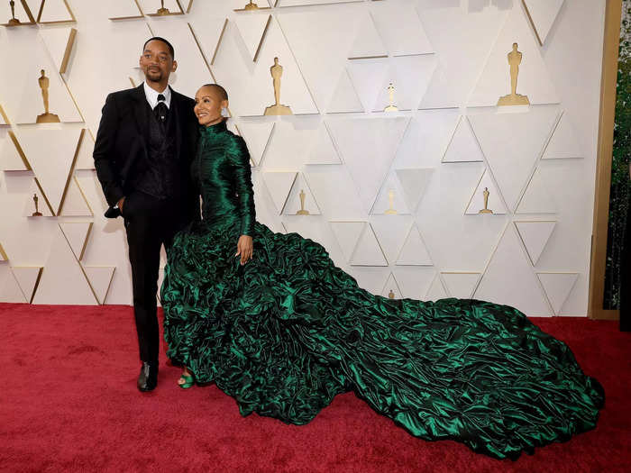 Jada Pinkett Smith wore a bold green dress alongside Will Smith.