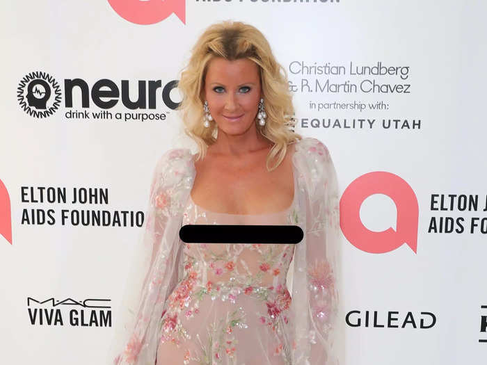 Chef Sandra Lee opted for a white, see-through gown covered in a pink flowers made from beads.