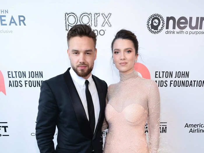 Maya Henry was in attendance and wore a strapless, peach leotard. On top of the garment, she wore a sheer, sparkling overlay with a high neckline, long sleeves, and feather details.