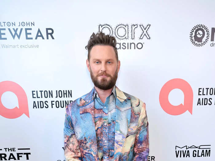 Bobby Berk took the opposite approach in a multicolored, swirled suit and matching shirt.