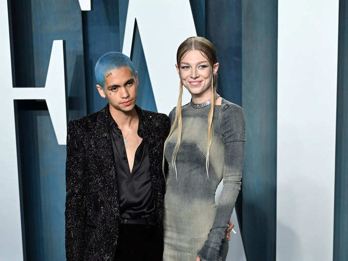 Dominic Fike wore a sequenced suit and unbuttoned shirt while his "Euphoria" costar Hunter Schafer opted for a grey floor-length gown.