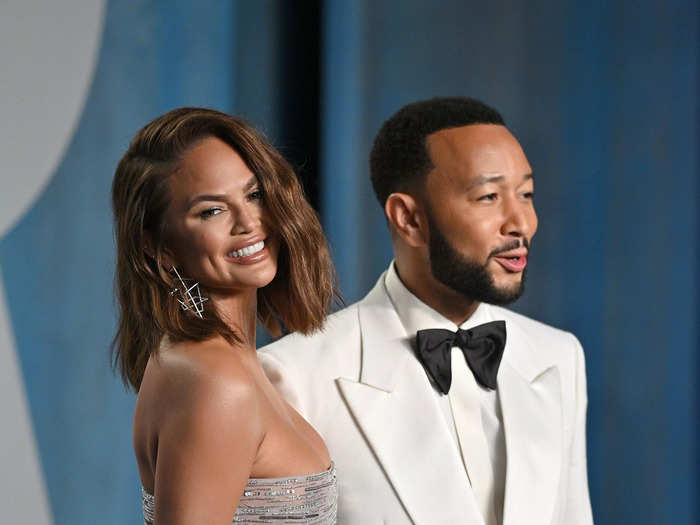 Chrissy Teigen sparkled in a silver sequenced gown and John Legend opted for a white suit and black bow-tie.