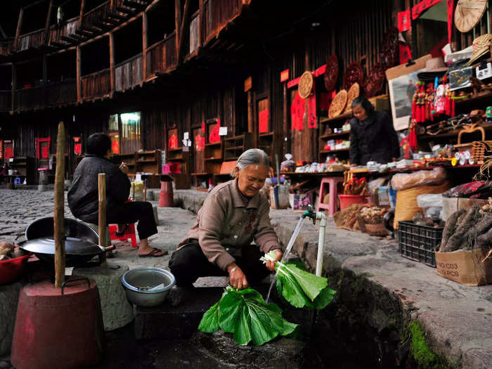 Despite being open to tourists, many elderly residents still call these buildings home.