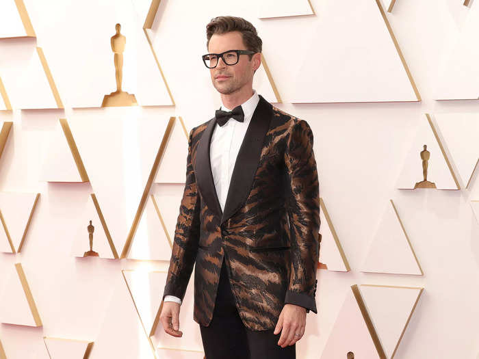 To analyze and judge celebrity style on the red carpet, Brad Goreski wore animal print.