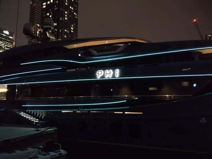 The vessel was brightly lit, with external blue and yellow strip lights.