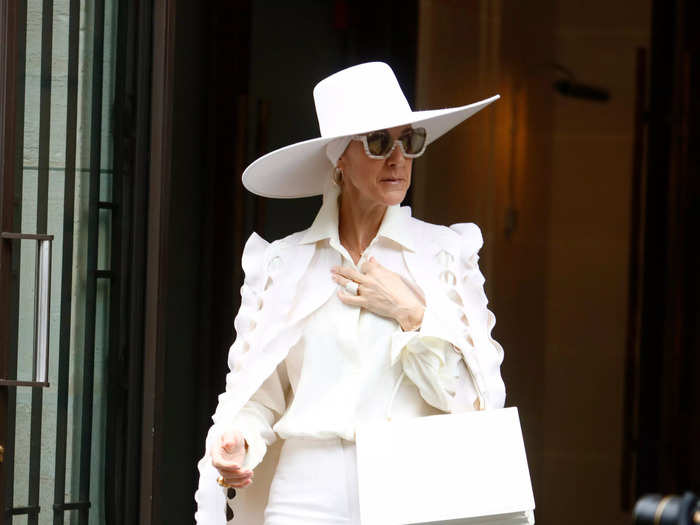 Her all-white cape look in July 2017 was dramatic and regal.