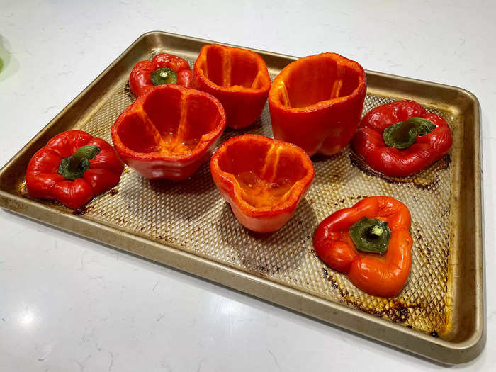 Preheat the oven to 350 degrees Fahrenheit and prepare the bell peppers.