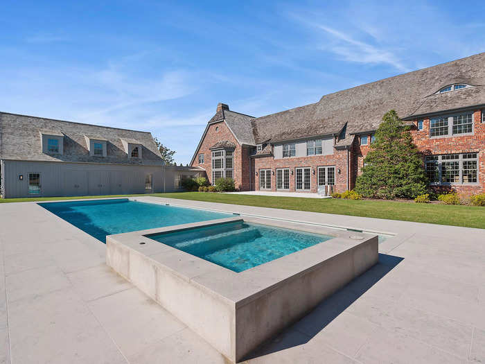 The estate also features a heated gunite swimming pool with an attached spa.