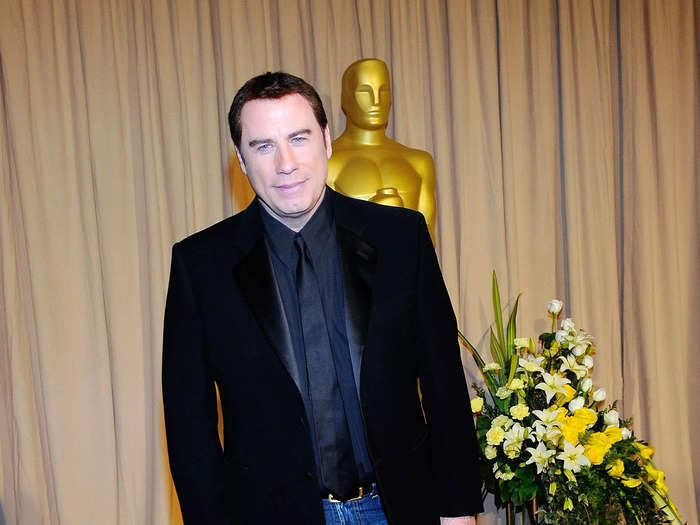 John Travolta wore casual denim to the prestigious Academy Awards in 2010.