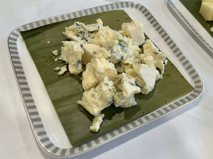 Items like cheese, including a block of award-winning blue cheese sourced from Rogue Creamery in Oregon, will be shipped via plane to the kitchen.