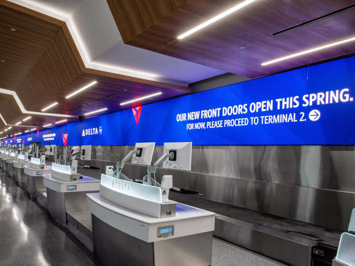 Stretching across the entire length of the lobby, a 250-foot digital wall will feature Sky Club capacity and gate information in both English and Spanish.