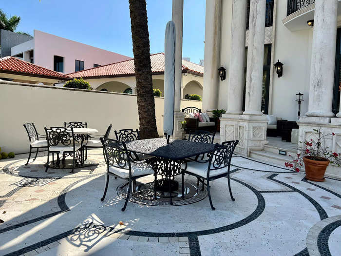 The backyard is complete with a patio for al fresco dining. The space is so large and striking, I can imagine many parties being hosted out here.