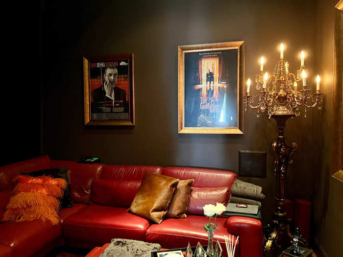 One of my favorite aspects was the media room. With a cozy red leather couch, old cinema posters, and big screen TV, it makes watching a movie luxurious.