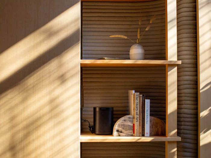 But the morning light that streamed into the bedroom-turned-office beautifully highlighted its walls and wooden finishes.