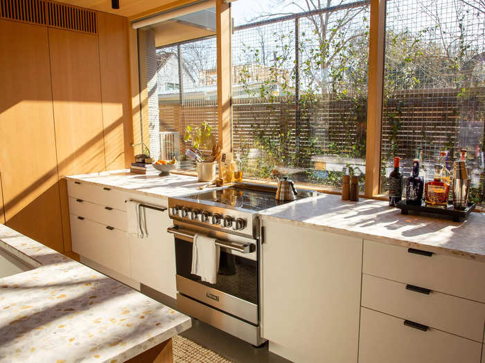 Because it was only partially sectioned off, the dining room still flowed into the kitchen and the living room.