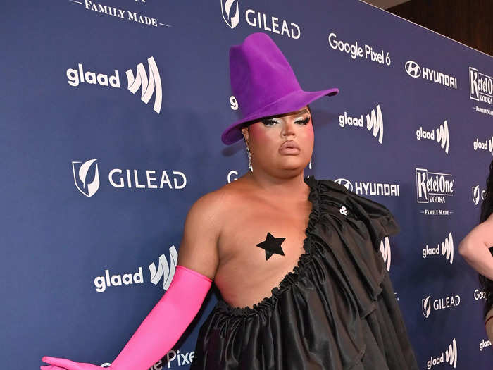 Drag queen Kandy Muse turned a layered black dress into a statement look.