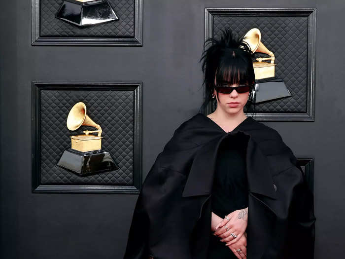 Billie Eilish served gothic glamour in an all-black look and dark sunglasses.